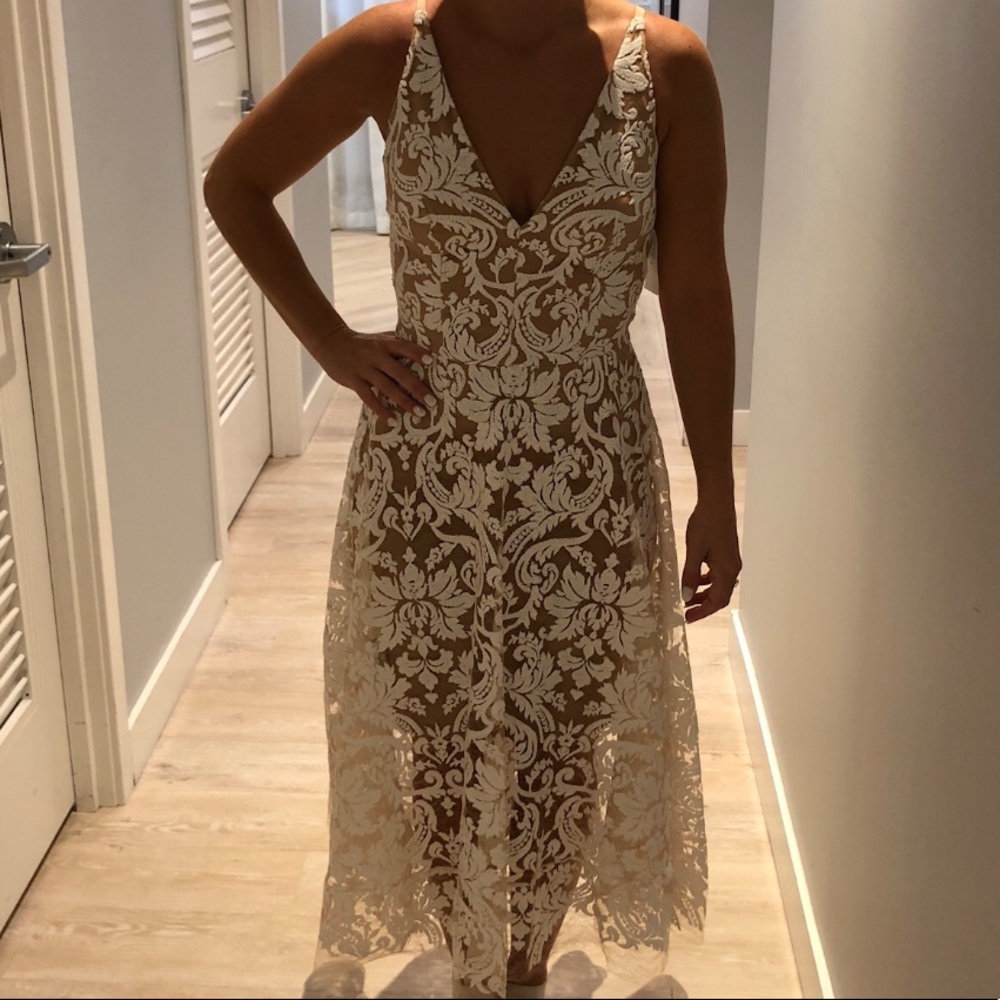 White/nude Dress size small never worn w tags.